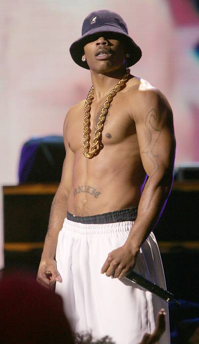 Thirst Trap Crescendo - Nelly channels the legendary &nbsp;LL Cool J with a Kangol hat and nothing else on but sweats.&nbsp;(Photo: Scott Gries/Getty Images)