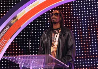 Stand Up - Uncle Snoop acts as rap royalty.(Photo: Bennett Raglin/BET/Getty Images for BET)
