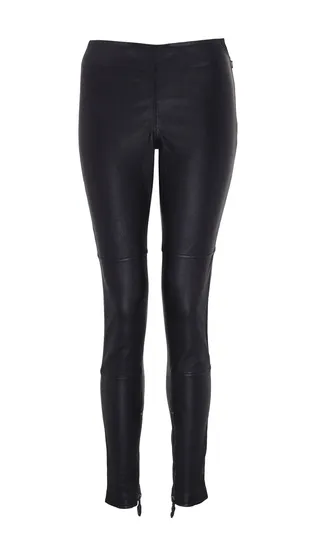 Leather Trousers - Upgrade your black tights situation with a luxurious leather version perfect for slipping under dresses with boots or wearing alone with an oversized sweater or button-down blouse.  (Photo: River Island Winter Collection)