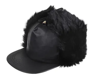 Trucker Hat with Faux Fur - The star takes the traditional trucker hat and makes it fresh again with faux fur ear flaps.  (Photo: River Island Winter Collection)