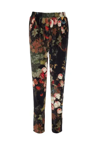 Velvet Floral Trouser - Match these fly trousers with its coordinating top and spiky stilettos to replicate Rihanna’s bad gal style or throw a blazer on top to make the look more demure.  (Photo: River Island Winter Collection)