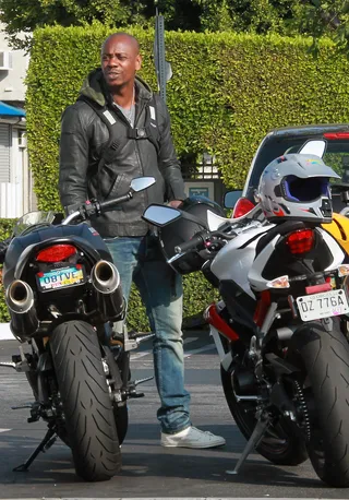 Revin' Up - Dave Chappelle takes his motorcycle out for a ride to the trendy West Coast boutique Fred Segal in West Hollywood to meet with friends.&nbsp;(Photo:&nbsp; JLM / Splash News)