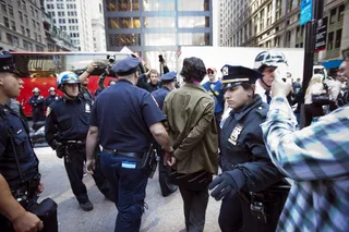 Fighting for Your Rights - A protestor is arrested on Broadway in front of Zuccotti Park on Sept. 19. He is among over 87 people who have already been arrested during the demonstrations.\r\r(Photo: Michael Nagle/Getty Images)