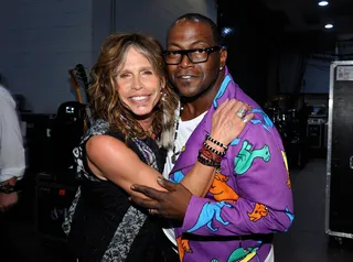 Steven Tyler and Randy Jackson - Rocker Steven Tyler and his American Idol co-judge Randy Jackson show love in the VIP Lounge at the iHeartRadio Music Festival in Las Vegas. (Photo: by John Sciulli/Getty Images)