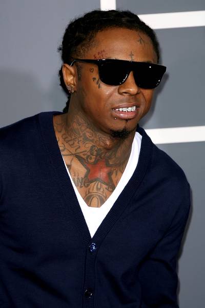Gone Till November - Six books, seven books ? or just one for now.&nbsp;Lil Wayne&nbsp;announced that he'll be releasing his first book, a memoir based on diary entries he wrote during his eight-month sentence for gun possession in New York.(Photo: Adriana M. Barraza/WENN.com)