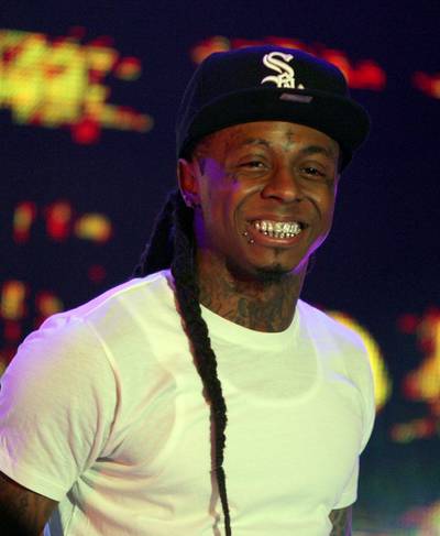 Lil’ Wayne to fans outside his home&nbsp; - &quot;Do me a favor, get the f*ck from out this neighborhood or get your head knocked the f*ck off, do that…”(Photo: PNP/WENN.com)