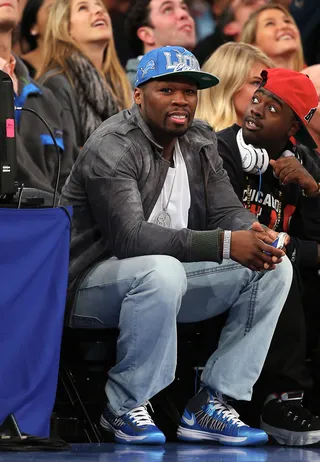Courtside View - Hip hop mogul 50 Cent enjoys a basketball game at Madison Square Garden in New York City between the New York Knicks and the Houston Rockets. &nbsp;(Photo: Elsa/Getty Images)