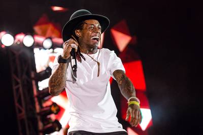 Lil Wayne Burns Down New Orleans - Lil Wayne proved he was The N.O.'s golden child as he ran through nearly 50 of his monstrous career hits, including &quot;A Milli,&quot; &quot;Go DJ&quot; and &quot;Truffle Butter.&quot; &nbsp;(Photo: Josh Brasted/WireImage)