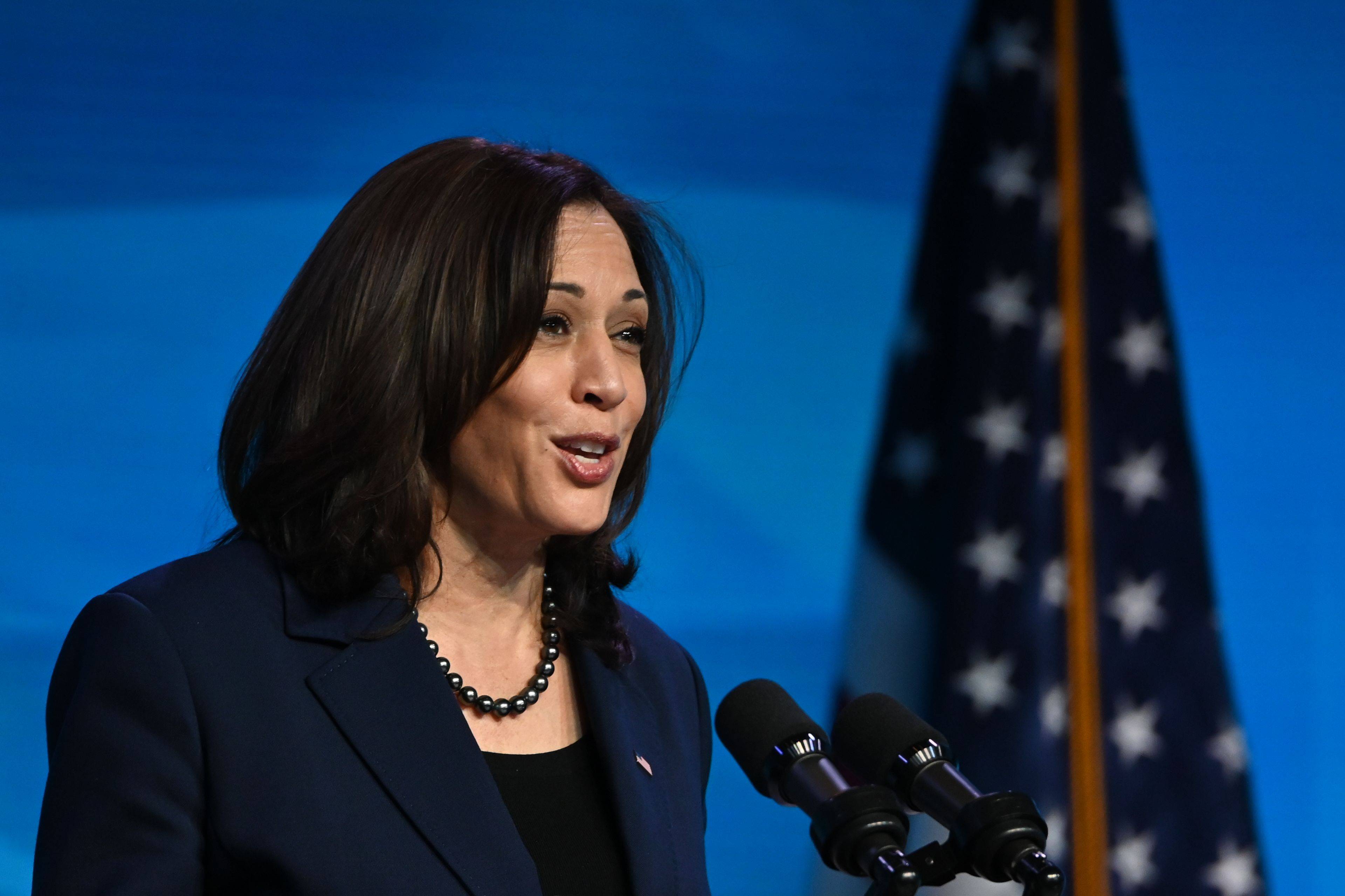 US Vice President-elect Kamala Harris speaks after US President-elect Joe Biden nominated their economic and jobs team at The Queen theater January 8, 2021 in Wilmington, Delaware. - Biden and Harris announced on January 8, 2021 the following nominees for their economic and jobs team: for Secretary of Commerce, Rhode Island Governor Gina Raimondo; for Secretary of Labor, Boston Mayor Marty Walsh; for Small Business Administrator, California official Isabel Guzman; and for Deputy Secretary of Commerce, Biden's former counselor Don Graves. (Photo by JIM WATSON / AFP) (Photo by JIM WATSON/AFP via Getty Images)