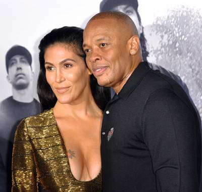 Dr. Dre and Nicole Young - Ever since this couple tied the knot back in 1994 they've been lit.&nbsp;(Photo:&nbsp;Christine Chew/UPI /LANDOV)