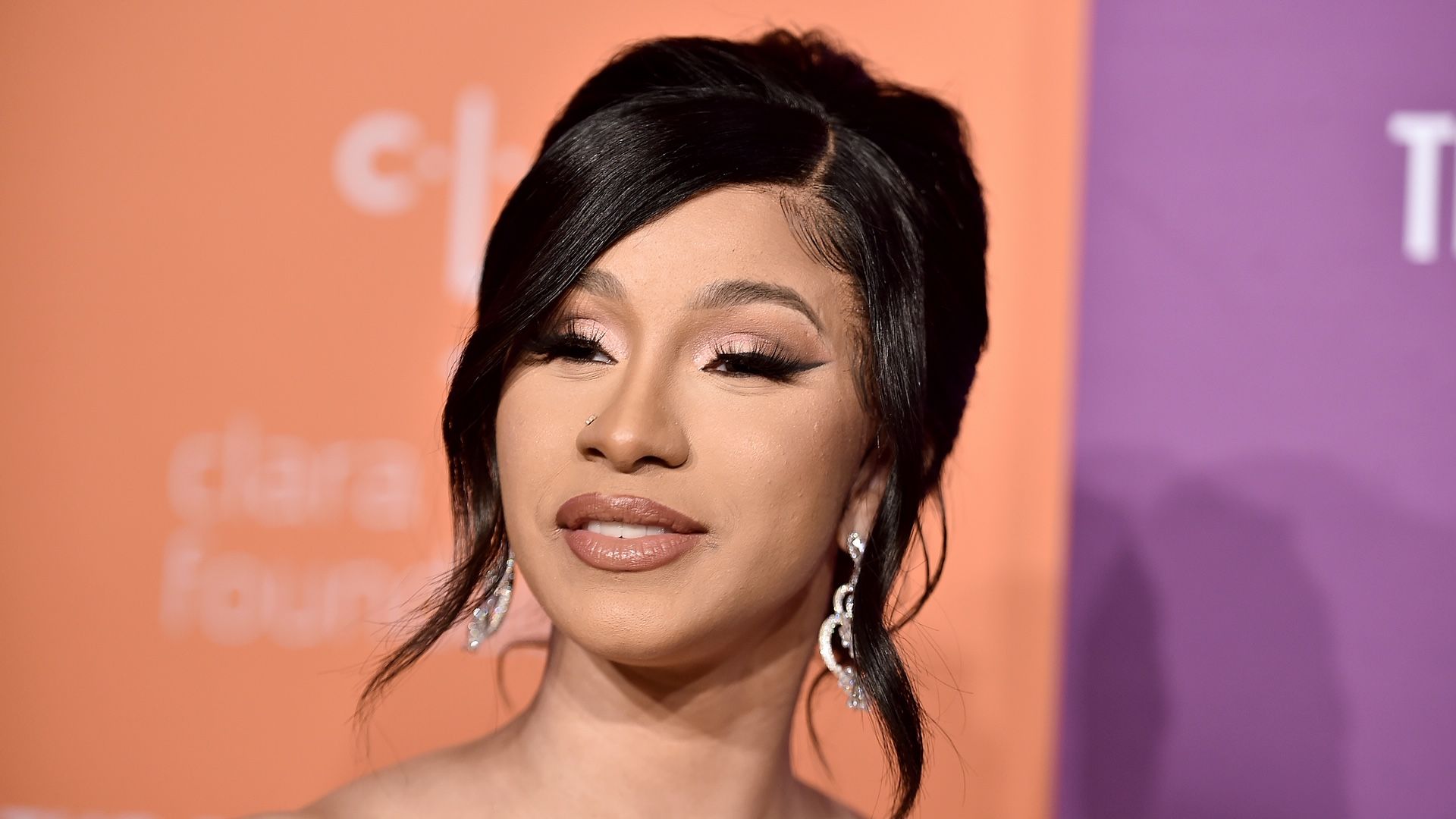 Cardi B Debuts Her Latest Tattoo - (Video Clip) | BET AWARDS 2022