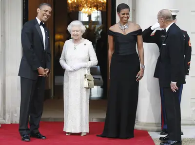 American Royalty Brushes With the British Royals - The president and first lady joined Britain's Queen Elizabeth II and Prince Philip for a reciprocal dinner at Winfield House in London, Wednesday, May 25, 2011. (Photo: AP Photo/Charles Dharapak)