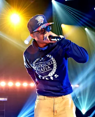 T.I. - T-I-P reporting live from the Hip Hop Awards 2015 stage!&nbsp; (Photo: Kevin Winter/Getty Images for iHeartMedia)