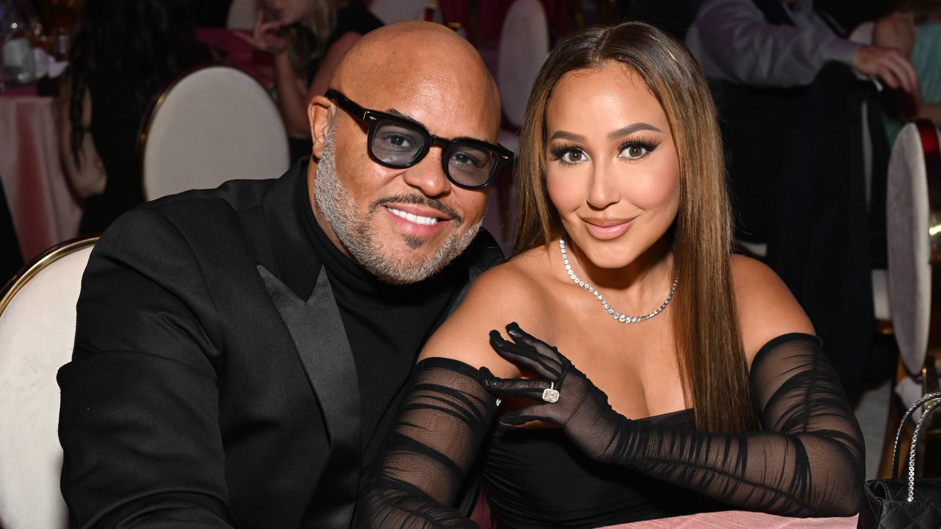 Israel Houghton and Adrienne Bailon attend the Elton John AIDS Foundation's 30th Annual Academy Awards Viewing Party on March 27, 2022 in West Hollywood, California. 