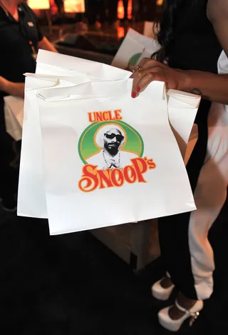 Mealtime - After another standout show, Uncle Snoop had meals to go for the fans hungry for more. (Photo: Moses Robinson/BET/Getty Images for BET)