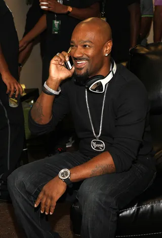 Big Tigger&nbsp;in the House - Before presenting with Joseline Hernandez, BET fam Big Tigger stopped to take a quick call backstage.  (Photo: Bennett Raglin/BET/Getty Images for BET)