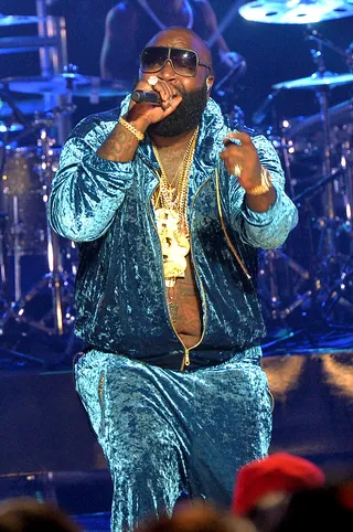 So Serious - Kevin Hart may not like it, but Rick Ross put on quite the show in his velvet suit. All eyes were on the Miami boss as he performed the Mastermind single "No Games."  (Photo: Rick Diamond/BET/Getty Images for BET)