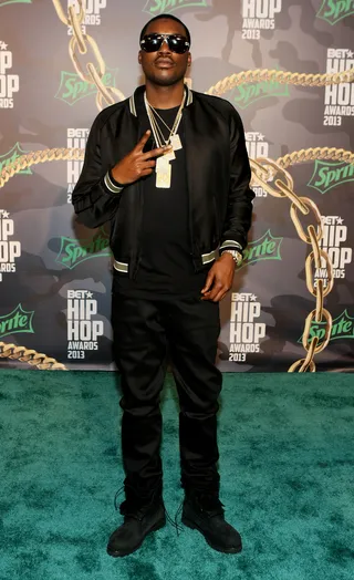 Meek Mill&nbsp; - On the eve of the release of Dreamchasers 3, Meek Mill rocks an all-black ensemble with signature MMG chain.&nbsp;
