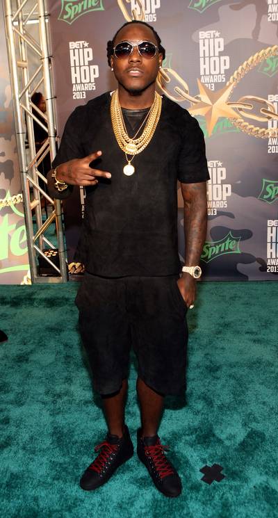 Ace Hood - Ace Hood takes the gold chain trend to new heights as he poses for BET.com with several gold chains and an all-black look with simple sneaks. &nbsp;&nbsp;(Photo: Bennett Raglin/BET/Getty Images for BET)