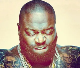 Rick Ross - The rapper cements his boss status with help from ice-cold yellow and white diamond chains.  (Photo: Instagram via Rick Ross)