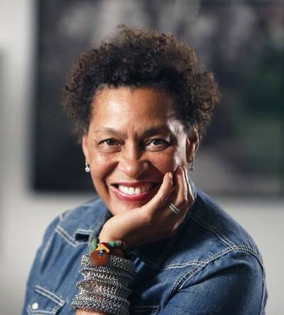Carrie Mae Weems - Carrie Mae Weems is a 2013 fellow, photographer and video artist, who explores African-American identity, class and culture in documentary-style works. Her work tackles tough subjects: the harsh realities of race, class and gender discrimination alongside the enduring resilience of the human character.(Photo: Courtesy of the John D. &amp; Catherine T. MacArthur Foundation)