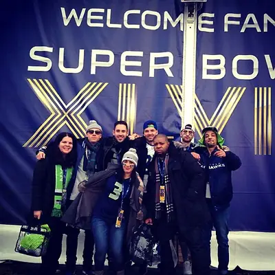Macklemore - The Grammy-winning MC is a Seattle native, so you know he’s amped for his home team’s Super Bowl win. To prove it, he sports his team’s colors from head to toe with his crew. (Photo: Macklemore via Instagram)