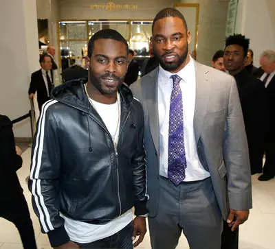NFL Off Duty - NFL Players Michael Vick and Justin Tuck cleaned up nicely for the Saks Fifth Avenue and Off the Field Players' Wives Association Charitable Fashion Show in New York City.(Photo: Jemal Countess/Getty Images for Saks Fifth Avenue)