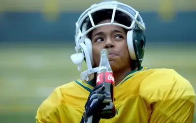 Coca-Cola - Coca-Cola releases an inspirational ad showing a young boy about to score a touchdown at his little league football game. He doesn’t stop there, taking the ball all the way to the Green Bay Packers' field instead. House of Pain’s “Jump Around” is featured in the commercial.&nbsp;&nbsp;(Photo: Coca- Cola)