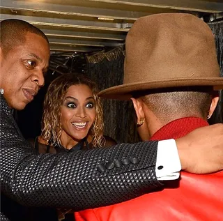 Tyson Beckford @tysoncbeckford - Model Tyson Beckford&nbsp;posted this shot of the Carters backstage at the Grammys admiring Pharrell's infamous &quot;Arby's&quot; style hat. Bey's reaction to the producers look is priceless.(Photo: Tyson Beckford via Instagram)