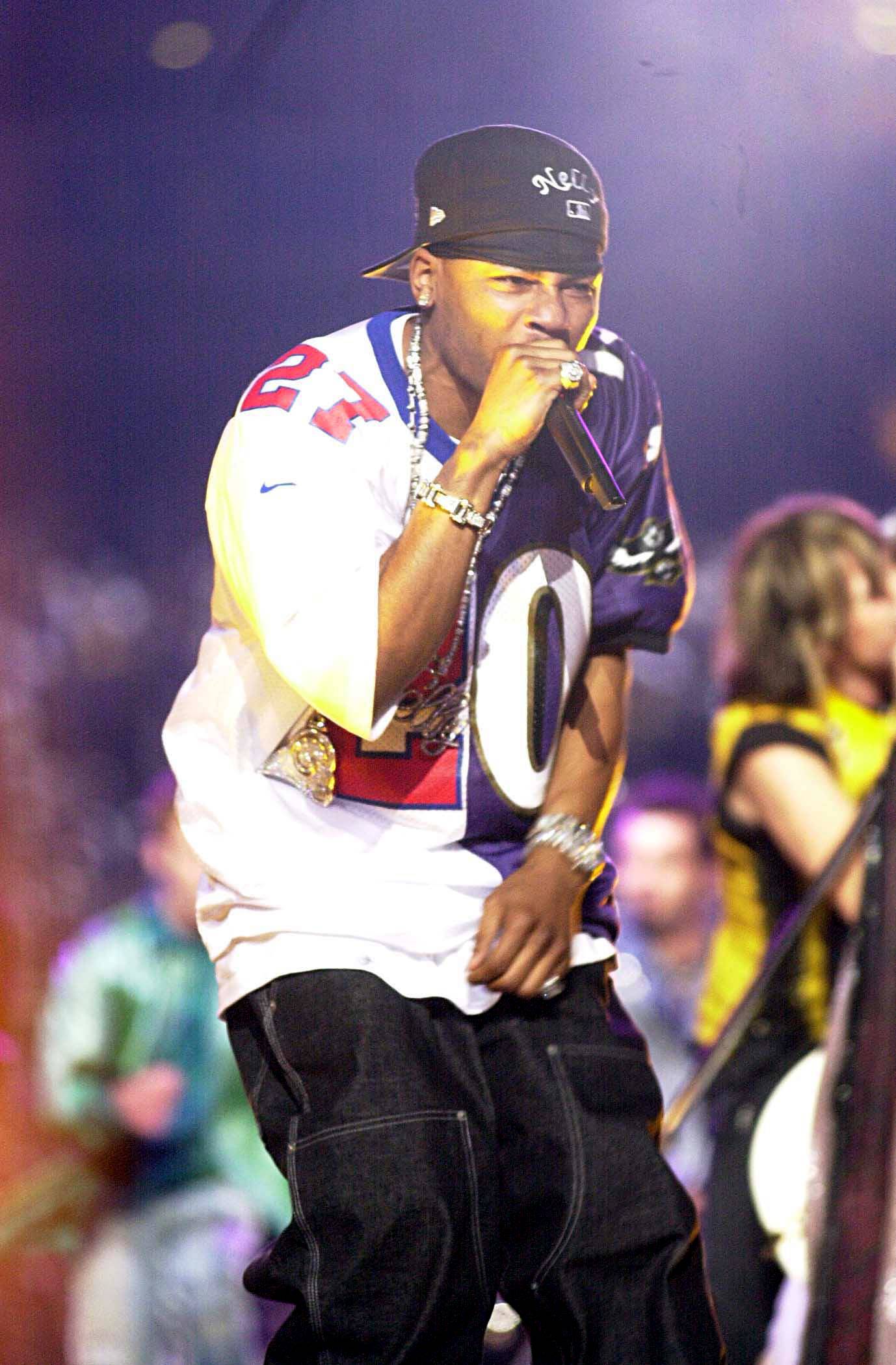 Nelly Shows Up at - Image 7 from Nelly's Best Sports Moments | BET