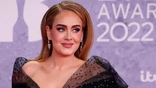 British singer Adele Laurie Blue Adkins aka Adele poses on the red carpet upon her arrival for the BRIT Awards 2022 in London on February 8, 2022.