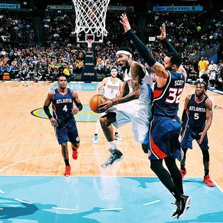 Aerial Imagination - Nothing like some aerial improvisation. Denver Nuggets point guard&nbsp;Ty Lawson knows.(Photo: Denver Nuggets via Instagram)