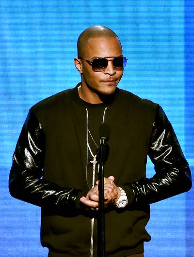 T.I.  - One of Tip's&nbsp;many charitable efforts is a Thanksgiving giveaway that helps feed Atlanta’s hungry during the holidays.(Photo:&nbsp;Kevin Winter/Getty Images)