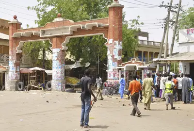 Blast at Nigerian Market Kills Dozens - According to local accounts told to the Associated Press, the explosion from a teenage girl suicide bomber killed at least 34 people on March 10 at a crowded market in northeastern Nigeria. Many more were reportedly wounded.(Photo: AP Photo/Jossy Ola)