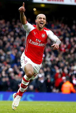 Theo Walcott: March 16 - Arsenal's very own star soccer player keeps scoring big at 26.(Photo: Eddie Keogh/Reuters/Corbis)