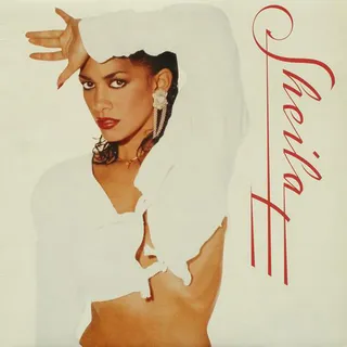 'Hold' It Down!  - Sheila E.'s &quot;Hold Me&quot; is an excellent single from her self-titled album. The ballad was an R&amp;B hit that peaked at No. 3 on the U.S. R&amp;B charts. Part two of the song is the non-album track &quot;The World Is High.&quot;