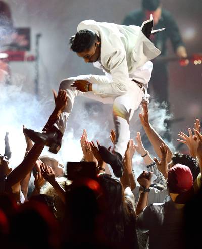 Twitter Reacts to Miguel's Leg Drop (@MiguelUnlimited) - Oh, the leg drop. What great memes you yield. After Miguel's failed jump&nbsp;during his performance at the 2013 Billboard Music Awards, Twitter exploded with all kinds of Hulk Hogan-neck-brace-Mr.Miyagi jokes. Even the Hulkster himself chimed in,&nbsp;praising the singer for practicing the art of the leg drop in its proper form.&nbsp;(Photo: Ethan Miller/Getty Images)