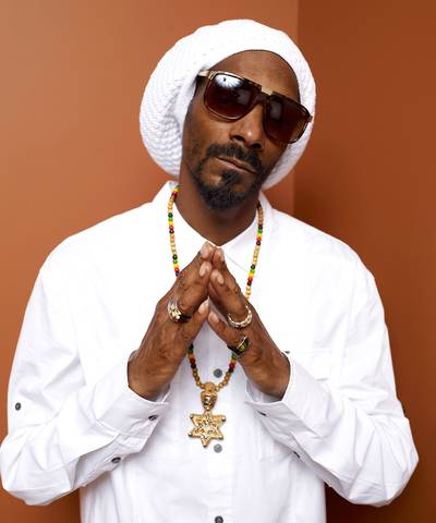Snoop Dogg - Raised in one of the roughest neighborhoods in Los Angeles and a gang member with a record before he graduated high school, young Snoop was on the path to self destruction before he met&nbsp;Dr. Dre. It took just one quadruple-platinum album to take him &quot;from the streets to the suites.&quot; (Photo: Matt Carr/Getty Images)