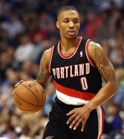 Damian Lillard, Portland Trail Blazers - Point Guard Damian Lillard is gearing up to make NBA All-Star history. He will become the first player to compete in three events, the Slam-Dunk contest, the Rising Stars game and the Skills Challenge.(Photo: Ronald Martinez/Getty Images)