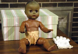 /content/dam/betcom/images/2013/05/National-05-16-05-31/051713-national-brown-vs-board-anniversary-african-american-baby-doll-black.jpg