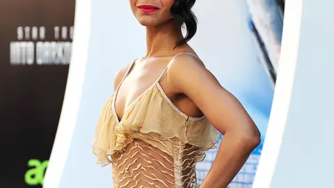 With Pride - Over the course of her career, Zoe Saldana has portrayed both Black and Latina women in her films. Saldana is of both Puerto Rican and Dominican descent and identifies as an Afro-Latina, embracing her African roots. Doing so has given strength to a young generation of women who have been given another role model to admire because of self-acceptance. (Photo: Frazer Harrison/Getty Images)
