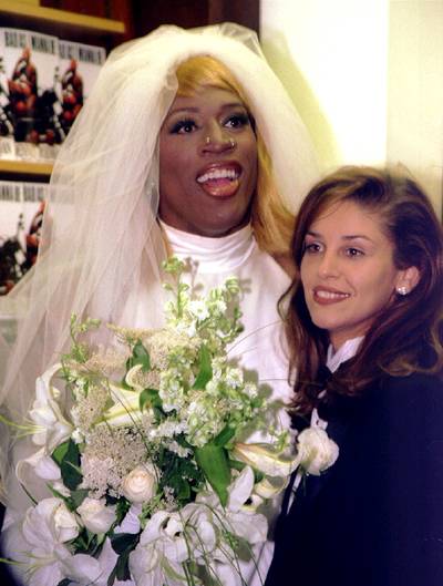 Fashion Foward - Rodman's fashion choices have always been a little out there (facial piercings and hair colors spanning the rainbow included), but nothing quite topped the wedding dress and blonde wig he wore during the press tour for his 1996 autobiography,&nbsp;Bad As I Wanna Be.&nbsp;(Photo: REUTERS/Peter Morgan/Files /Landov)
