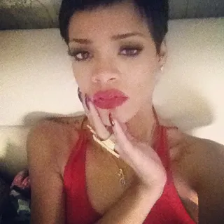 Sigh... - Trying to pretend like this isn't a selfie by looking innocent? We see the arm.  (Photo: instagram/badgalriri)