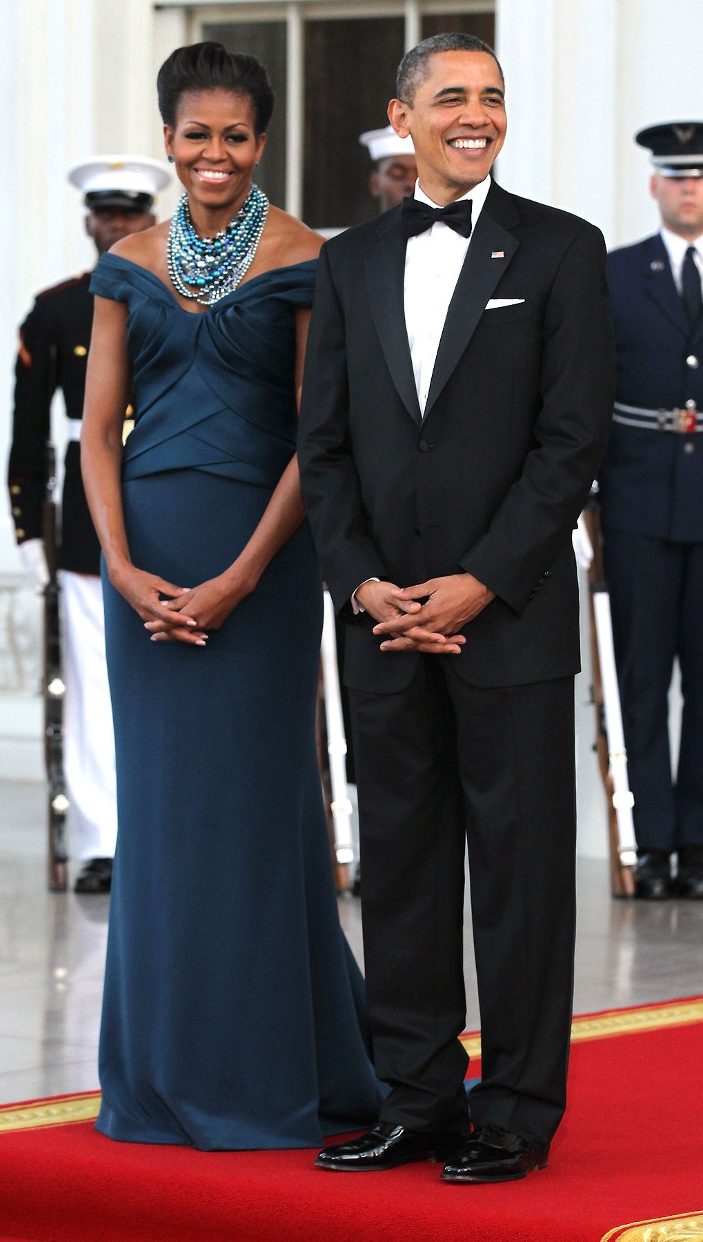 Blue Bombshell - How stunning is the first lady in this Marchesa dress? The Obamas hosted British Prime Minister David Cameron and his wife on March 14, 2012. (Photo: Alex Wong/Getty Images)