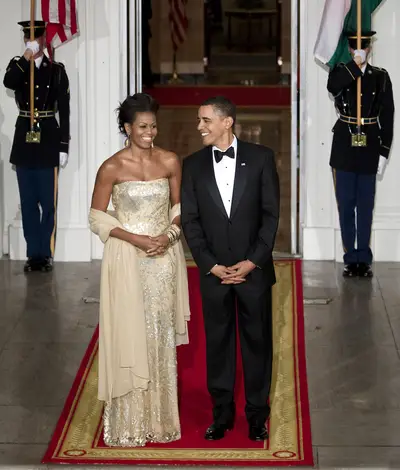 &quot;This Is, Like, So Cool, Right?&quot; Said the Husband to His Wife - The president and first lady await the arrival of the Indian Prime Minister Manmohan Singh and his wife Gursharan Kaurat at the North Portico of the White House Nov. 24, 2009, on the occasion of their first State Dinner.&nbsp;  (Photo: Brendan Smialowski/Getty Images)