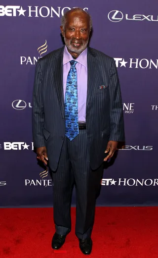 The Stylings of a Mogul: Clarence Avant - Music industry mogul and visionary Clarence Avant is set to recieve the Entrepreneur Award at the 2013 BET Honors. He wore a classic navy pinstripe suit that only a real boss could pull of. &nbsp;(Photo: Paul Morigi/Getty Images for BET)