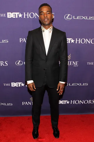 What a Gentlemen Looks Like: Luke James - R&amp;B crooner Luke James put a contemporary twist on a tuxedo by wearing an embellished color button down underneath.(Photo: Paul Morigi/Getty Images for BET)