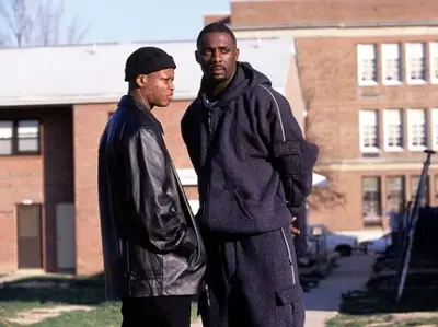 The Wire - Idris Elba will always be remembered for his role as Stringer Bell on HBO’s The Wire.&nbsp; Bell’s character is named after two Baltimore drug lords (Stringer Reed and Roland Bell) and his life is similar to businessman Kenneth A. Jackson.\r(Photo: Courtesy of HBO via IMDB)
