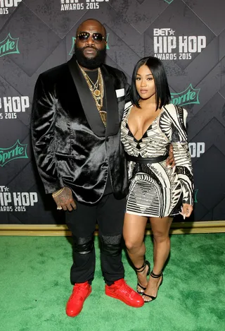 Rick Ross and Lira Galore  - Earlier this year, the Maybach Music mogul proposed to his 21-year-old girlfriend. While Rozay chooses to stay low-key about the engagement, Galore took to Instagram and Snapchat to share the news and show off her massive emerald-cut diamond with the caption, “Forever yours. Thanks @rafaelloandco for making everything EXTRA special! #Mrs." These two split up for a while in October, but things seem to be back on for now.  (Photo: Bennett Raglin/BET/Getty Images for BET Networks)