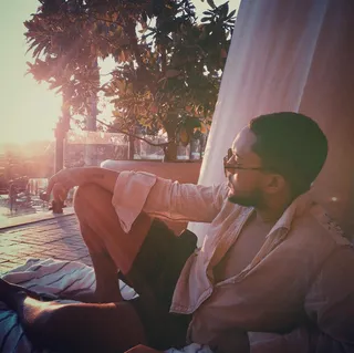 Tahj Mowry @tahj_mowry - Can we make the Baby Daddy star our babby daddy? Yeah, we went there. But in all seriousness, who wouldn't want to be cuddled up with Tahj and this view.(Photo: Tahj Mowry via Instagram)